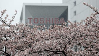 Toshiba warns of $8.4 bln net loss   