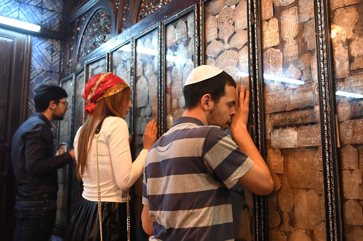 Jewish pilgrims pray at the Ghriba synagogue in the Tunisian resort island of Djerba. (AFP)