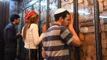 Jewish pilgrims pray at the Ghriba synagogue in the Tunisian resort island of Djerba. (AFP)