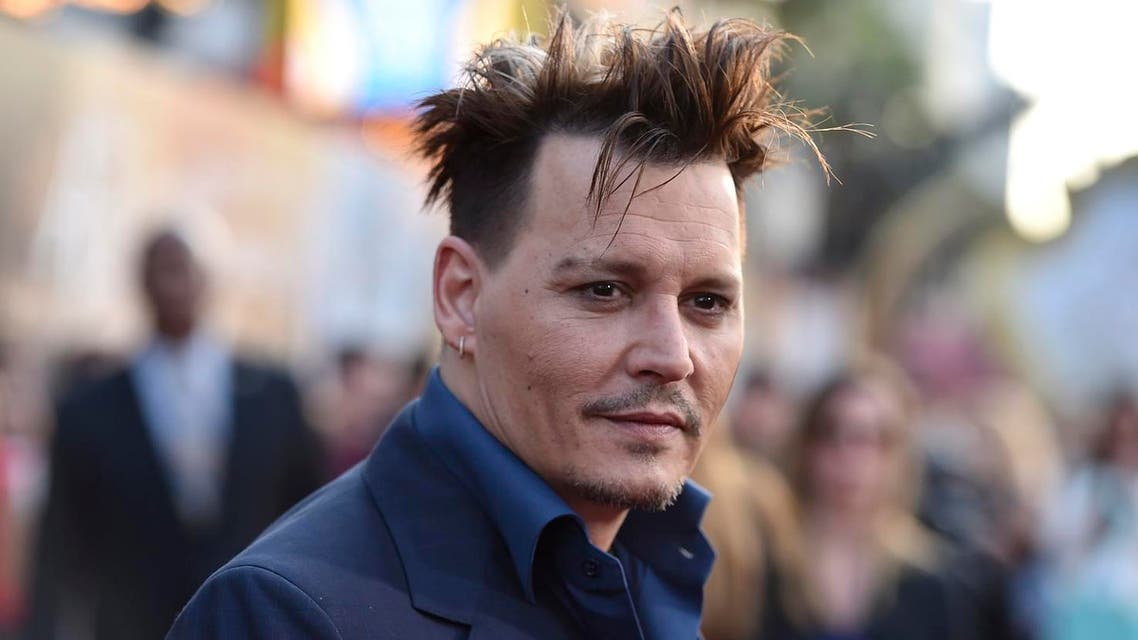 Johnny Depp arrives at the premiere of "Alice Through the Looking Glass" at the El Capitan Theatre in Los Angeles. (AP)