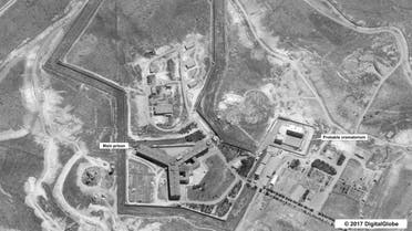 (FILES) A handout satellite image dated April 18, 2017 courtesy of DigitalGlobe and released May 15, 2017 by the US Department of State shows the Saydnaya prison, one of Syria's largest detention centres, located 30 kilometres (18 miles) north of Damascus. The United States on May 15, 2017 accused Syria of building a prison crematorium to destroy the remains of thousands of murdered detainees, putting pressure on Russia to rein in its ally. Warning Moscow it should not turn a blind eye to Bashar al-Assad's crimes, the State Department released satellite images that it said backed up reports of mass killings at the Syrian jail. (AFP)