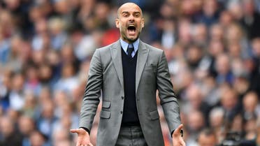 Manchester City's Spanish manager Pep Guardiola gestures on the touchline during the English Premier League football match between Manchester City and Leicester City at the Etihad Stadium in Manchester, north west England, on May 13, 2017. Manchester City won the game 2-1. (AFP)
