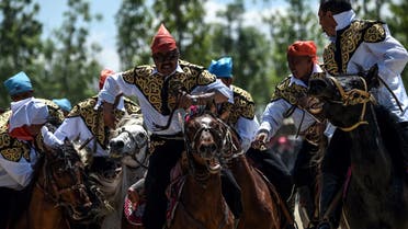 Horseriders practice the traditional central Asian sport Kok-boru, know also as Buzkashi or Ulak Tartis ("goat grabbing") on May 11, 2017, during the Ethnosports Culture Festival in Istanbul. (AFP)