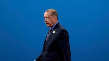 Turkey's President Recep Tayyip Erdogan leaves the stage after speaking during the opening ceremony of the Belt and Road Forum at the China National Convention Center (CNCC) in Beijing, Sunday, May 14, 2017. (AP)