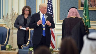 IN PICTURES: Saudi King Salman presents Trump with King Abdulaziz Medal