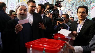Iran's President Hassan Rouhani casts his ballot during the presidential election in Tehran, Iran, May 19, 2017.reuters