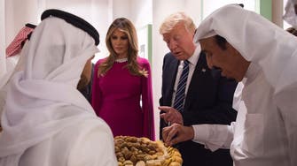 Melania, Donald Trump sample traditional Saudi dates and coffee