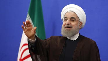 Newly re-elected Iranian President Hassan Rouhani gestures during a televised speech in the capital Tehran on May 20, 2017. Iranians have chosen the "path of engagement with the world" and rejected extremism, President Hassan Rouhani said following his resounding re-election victory. AFP