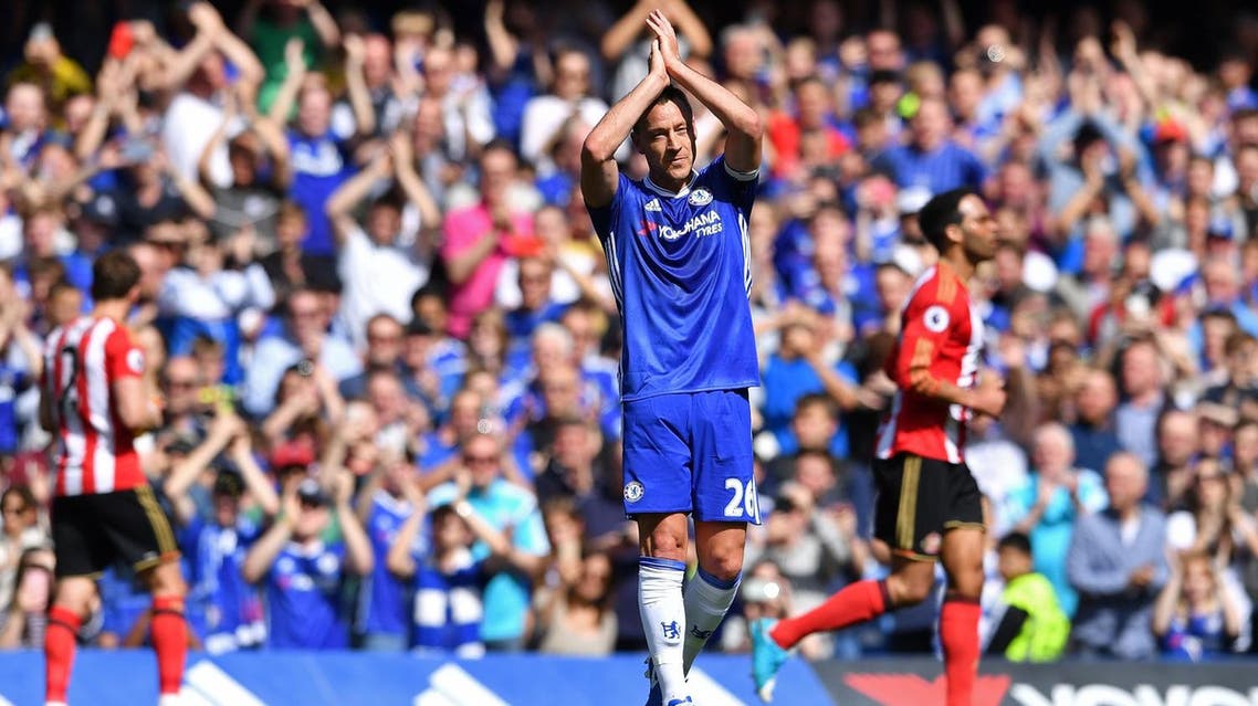 Chelsea's English defender John Terry gestures to the crowd as he is substituted off in the 26th minute during the English Premier League football match between Chelsea and Sunderland at Stamford Bridge in London on May 21, 2017. Terry will be leaving the club has been associated with for 22 years at the end of the season. (AFP)