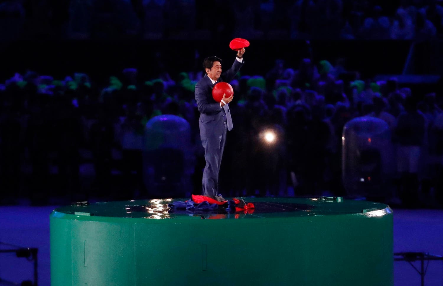 Japan's Prime Minister Shinzo Abe waves during the closing ceremony for the Summer Olympics in Rio de Janeiro, Brazil, Sunday, Aug. 21, 2016. (AP)