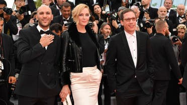 The Un Certain Regard jury (From L) Egyptian director Mohamed Diab, US actress Uma Thurman and French actor Reda Kateb arrive on May 18, 2017 at the 70th edition of the Cannes Film Festival. (AFP)