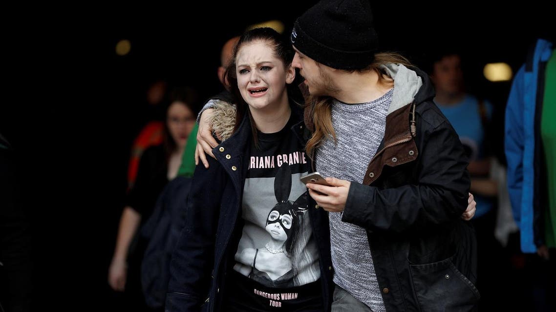 People rush out of the Arndale shopping centre as it is evacuated in Manchester, Britain May 23, 2017. REUTERS/Darren Staples TPX IMAGES OF THE DAY