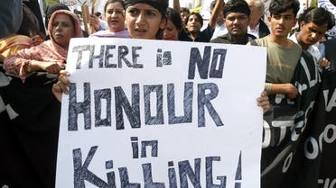 Pakistani supporters of Citizen's Action Group protest against honour killings during a demonstration in the capital Islamabad October 8, 2004. (Reuters)