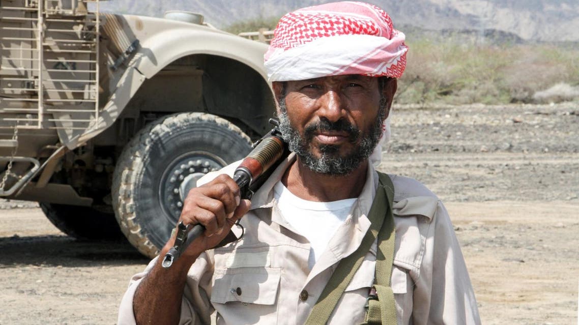 A Yemeni fighter loyal to the Saudi-backed Yemeni president poses for a picture in a mountainous region northwest of Taiz, on April 20, 2017. (AFP)