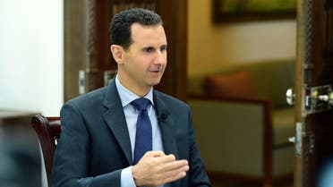 Bashar al assad photo from Reuters