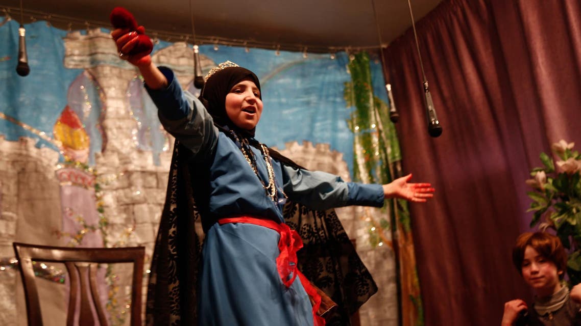 Syrian refugees snow white play, AFP