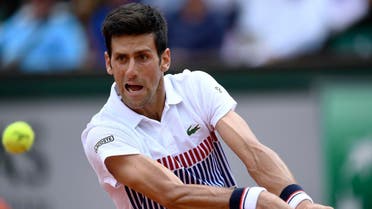 Serbia's Novak Djokovic returns the ball to Spain's Marcel Granollers during their tennis match at the Roland Garros 2017 French Open on May 29, 2017 in Paris. AFP