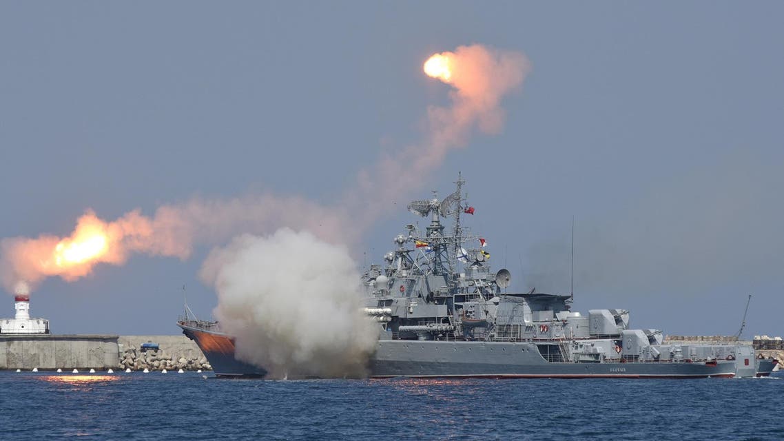 A Russian warship fires during celebrations for Navy Day in the Black Sea port of Sevastopol, Crimea, July 26, 2015. (Reuters)
