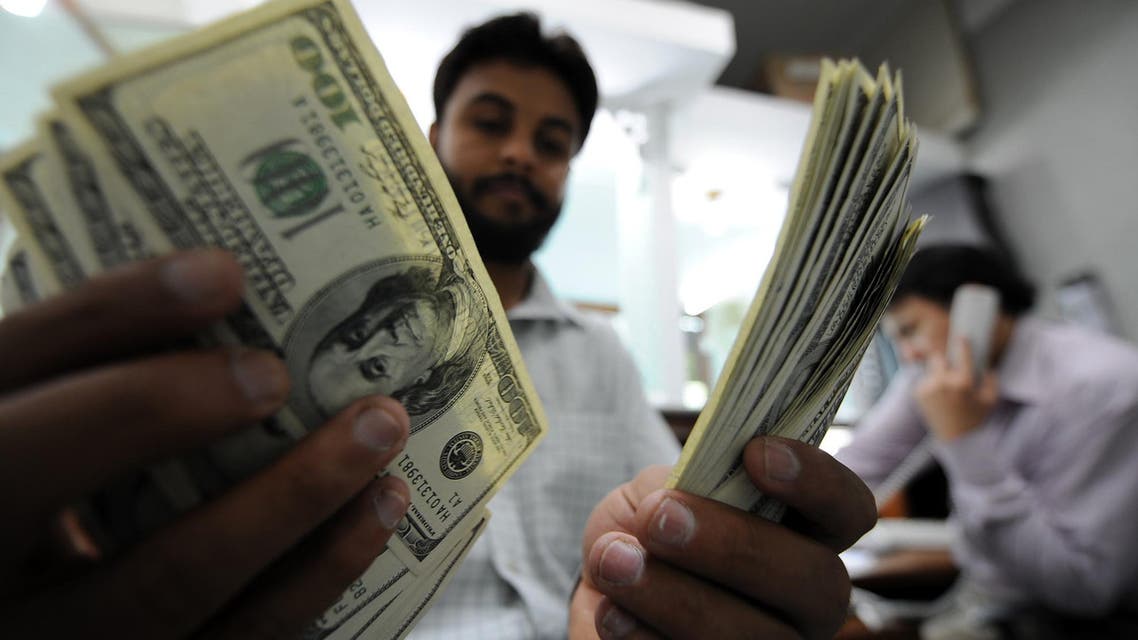 Dollars being counted