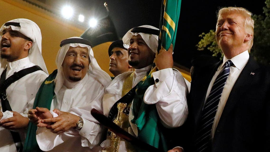 Saudi Arabia's King Salman bin Abdulaziz Al Saud (2nd L) welcomes U.S. President Donald Trump to dance with a sword during a welcome ceremony at Al Murabba Palace in Riyadh, Saudi Arabia May 20, 2017. (Reuters)