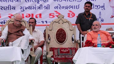 Senior BJP leader, LK Advani (L) and the then Gujarat Chief Minister and now Prime Minister, Narendra Modi, during an anti-corruption march near Ahmedabad on November 6, 2011. (AFP) 