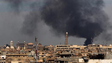Smoke billows from behind the Great Mosque of al-Nuri in Mosul’s Old City on April 17, 2017, during an offensive by Iraqi security forces to recapture the city from ISIS militants. (AFP)