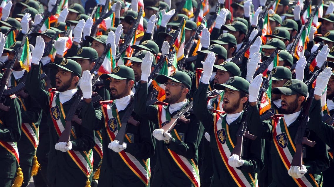 Members of IRGC participating in a march past during an annual military parade in Tehran, on September 22, 2013. (AFP)