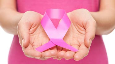 Woman with breast cancer awareness ribbon 