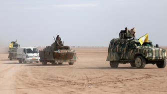 US-backed force says seized first western district in Raqqa 