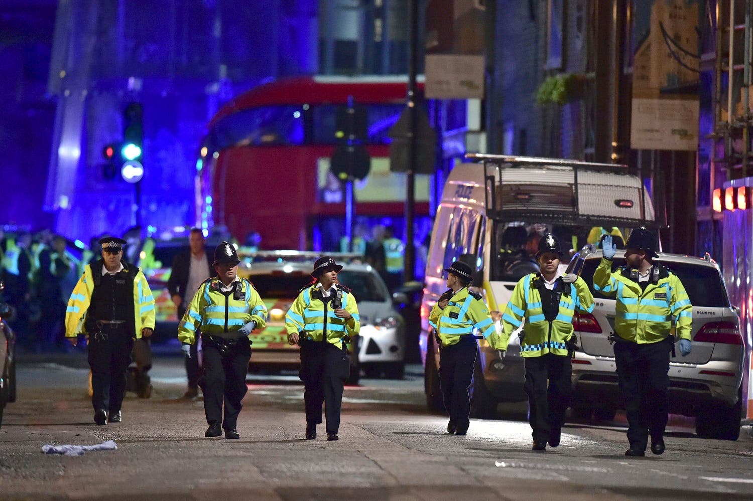 Police officers on Borough High Street as police are dealing with an incident on London Bridge in London, Saturday, June 3, 2017. (AP)