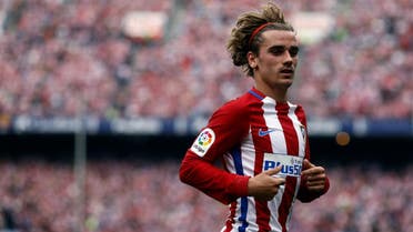 Atletico de Madrid's forward Griezmann runs during the Spanish league football match Club Atletico de Madrid vs Athletic Club Bilbao at the Vicente Calderon stadium in Madrid on May 21, 2017. AFP