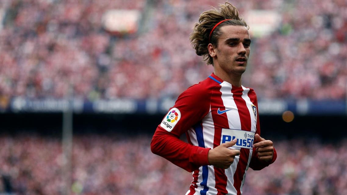 Atletico de Madrid's forward Griezmann runs during the Spanish league football match Club Atletico de Madrid vs Athletic Club Bilbao at the Vicente Calderon stadium in Madrid on May 21, 2017. AFP