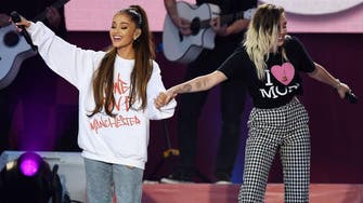Ariana Grande returns to Manchester to honor victims with benefit