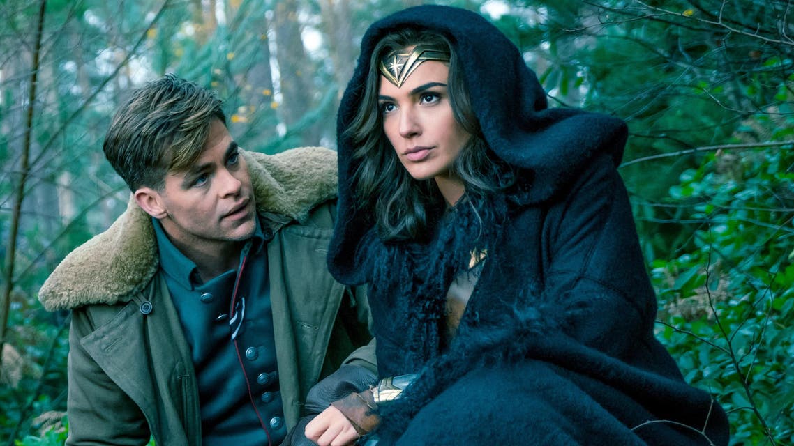 (L-R) CHRIS PINE as Steve Trevor and GAL GADOT as Diana in the action adventure "WONDER WOMAN." (Warner Bros. Pictures release)