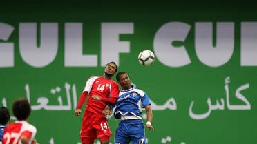 UAE’s Abdulaziz Mohammed (L) jumps to head the ball with Kuwait’s Ahmed Nasser during the under-23 Gulf Cup final football match in the Qatari capital Doha on August 7, 2010. (AFP)