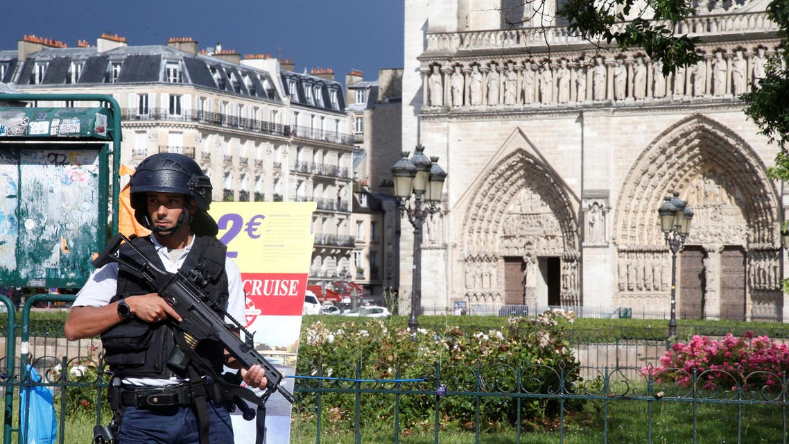 French police stand at the scene of a shooting incident near the Notre Dame Cathedral in Paris, France, June 6, 2017. (Reuters)