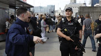 Three more arrests in London terror probe, searches underway