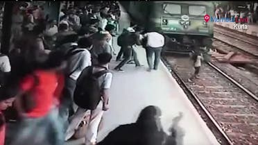 woman hit by train in India 