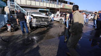 Woman suicide bomber kills at least 30 in Iraqi market