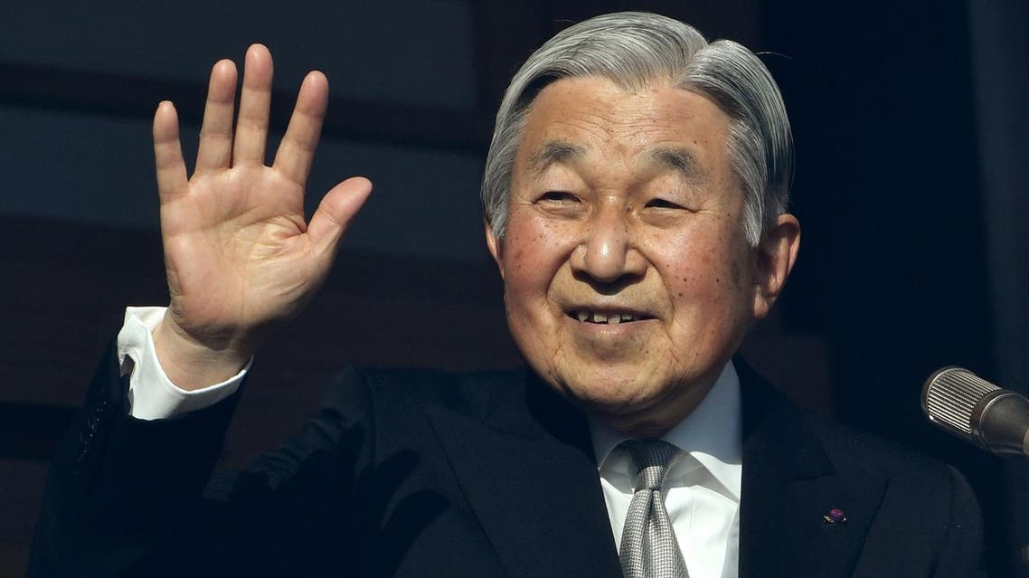This file photo taken on January 2, 2017 shows Japan’s Emperor Akihito waving to well-wishers during his new year speech on the balcony of the Imperial Palace in Tokyo. (AFP)