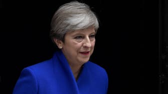 British PM Theresa May seeks deal to cling to power