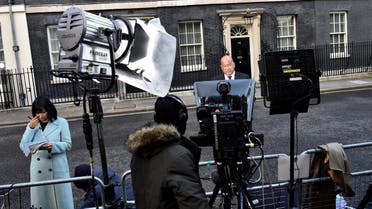 Media is seen close to the door of Number 10 Downing Street on the morning after Britain's election in London, Britain June 9, 2017. (Reuters)