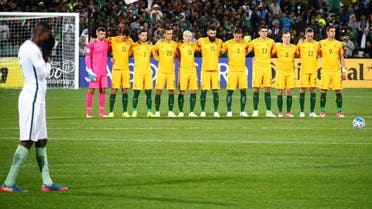  The Australian team stand together as they observe a minute's silence for victims of the London attacks, in which two Australians died. (Reuters)