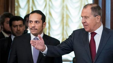 Russian Foreign Minister Sergey Lavrov, right, welcomes Qatari Foreign Minister Sheikh Mohammed bin Abdulrahman bin Jassim Al-Thani during their meeting in Moscow. (AP)