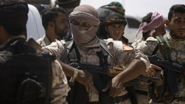 Members of the US-backed Syrian Democratic Forces (SDF) stand in the village of Hazima on the northern outskirts of the Islamic States (IS) group's Syrian bastion of Raqa on June 6, 2017. SDF broke into Raqa less than an hour after declaring a new phase in their fight for the city. (AFP)