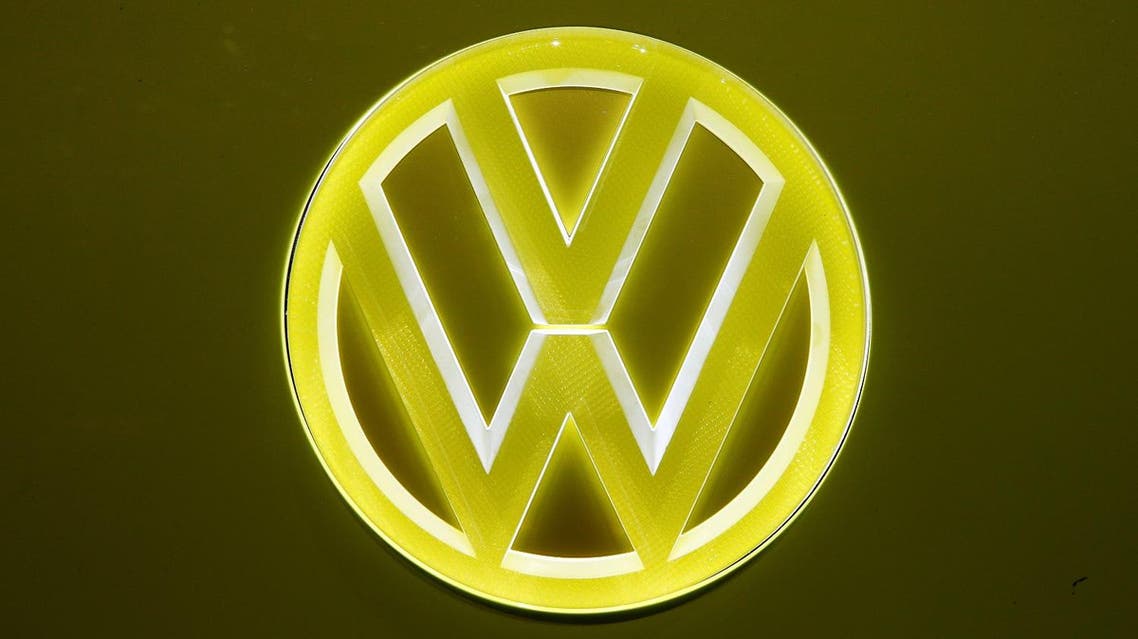 An illuminated logo is seen at a Volkswagen I.D. Buzz concept car during the 87th International Motor Show at Palexpo in Geneva Switzerland March 8, 2017. REUTERS/Arnd Wiegmann