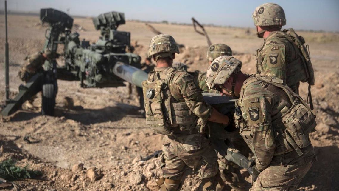 This June 10, 2017 photo provided by Operation Resolute Support, US Soldiers with Task Force Iron maneuver an M-777 howitzer. (AP)