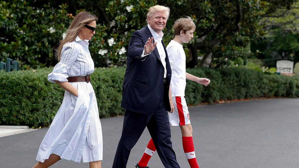 President Donald Trump, first lady Melania Trump, and their son and Barron Trump, walk to Marine One across the South Lawn of the White House in Washington, Saturday, June 17, 2017, en route to Camp David in Maryland. (AP)