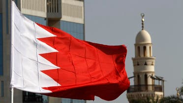 A Bahraini flag raised by protesters flutters in front of a local mosque during an anti-government demonstration at the Bahrain Financial Habour in Manama, March 7, 2011. Bahrain suffered its worst unrest since the 1990s last month when seven people died in a heavy-handed security response to protests by Shi'ites who have long complained of discrimination in Sunni-ruled Bahrain, a close U.S. and Saudi ally. REUTERS/Hamad I Mohammed