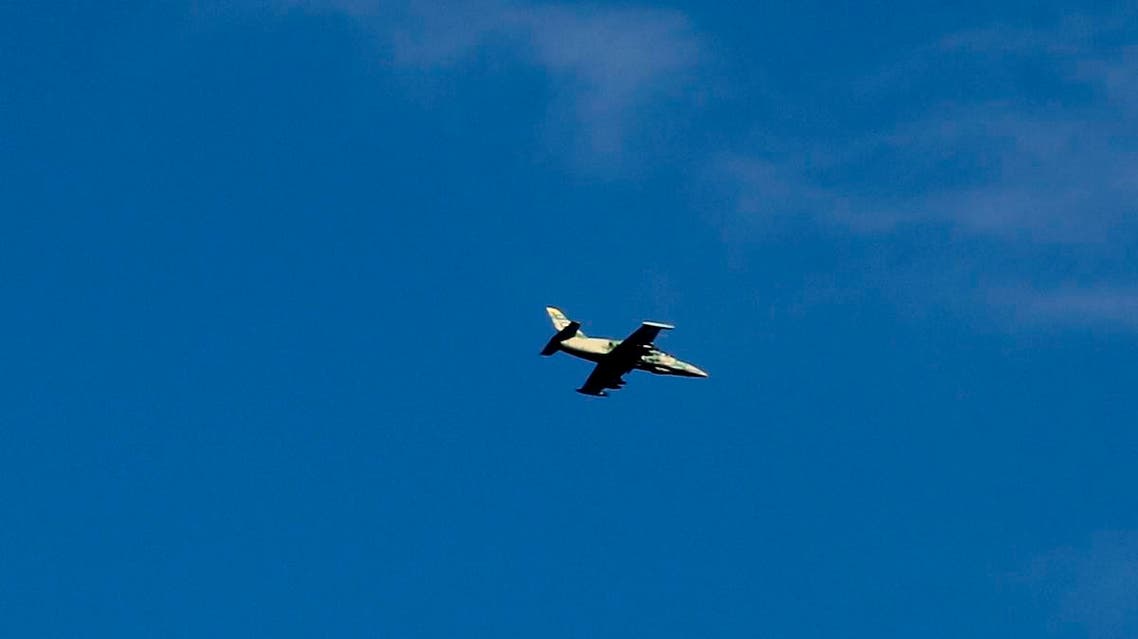 A Syrian war plane is seen flying over the village of Jibreen south of Aleppo, Syria. (File photo: AP)